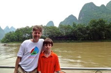 Kevin & Alex on a four hour boat trip down the Li River in southeast China.