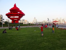 Alex flies a kite at Qingdao's May 4 Square.